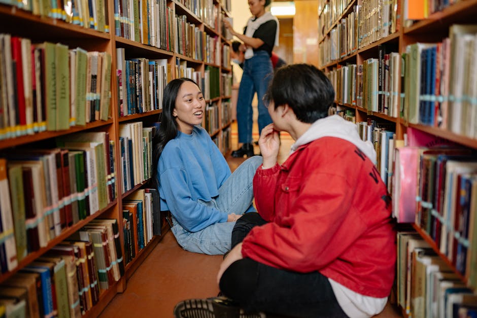 Two students having a conversation in a 