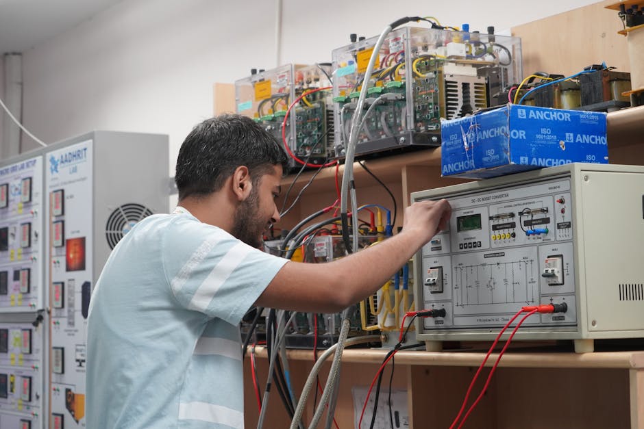 Engineer adjusting equipment in an advan